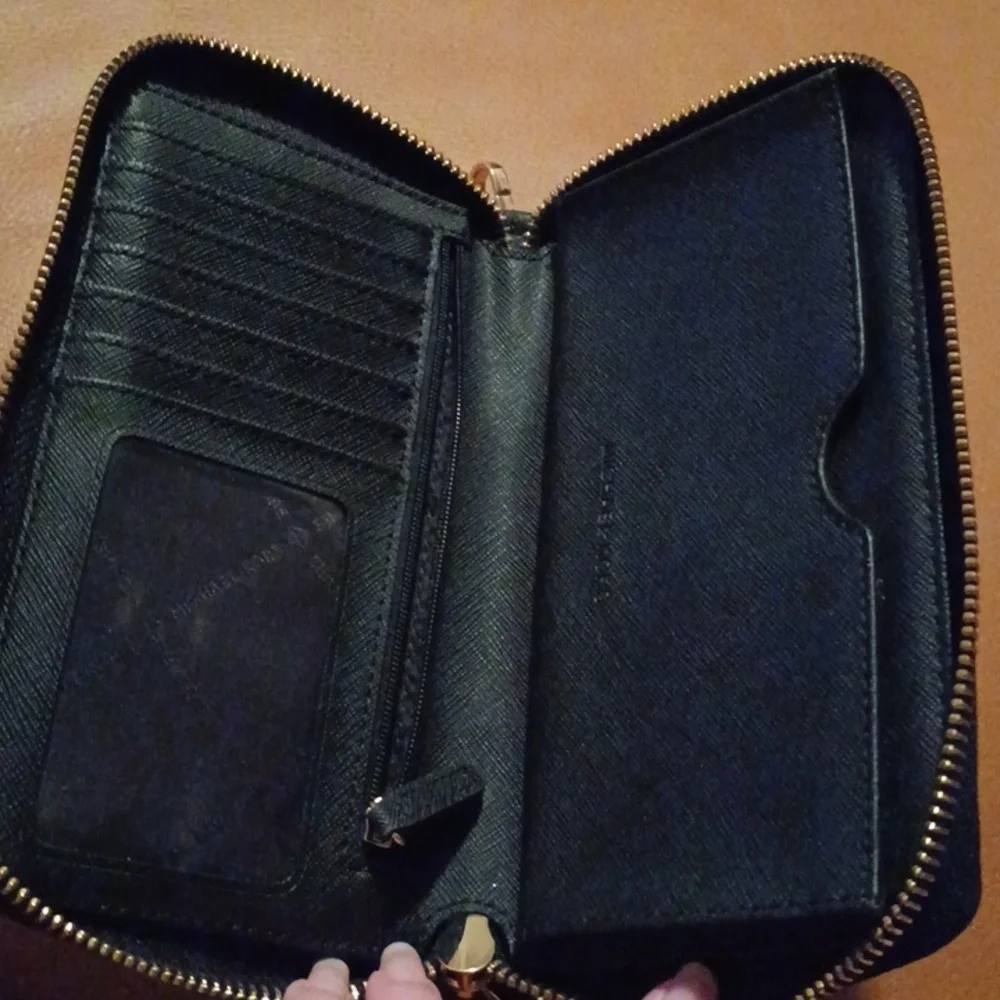 > Michael Kors Black Wristlet with Gold Accents